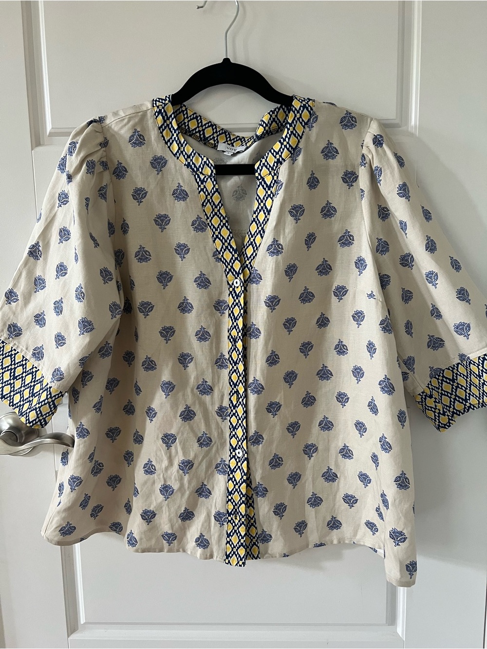 Women’s Cream Top with Blue Floral Detail - Picture 1 of 1